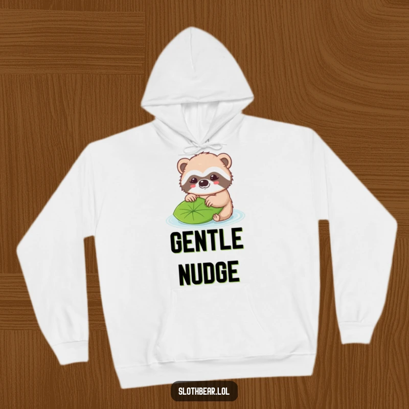 Funny hoodie showing a kawaii sloth bear character tenderly nudging a leaf as it floats along.