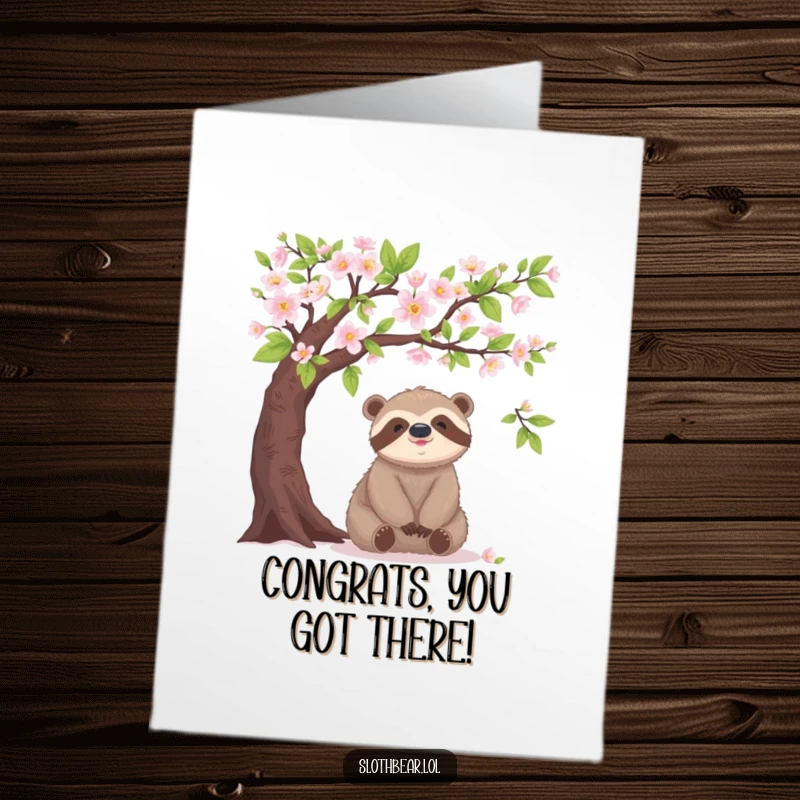 Free Printable Congratulations Card: A sloth bear sits contentedly under a tree branch with delicate blossoms.